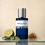 Reflection Homme by Aromara, 35% extrait perfume bottle on a glass shelf with halved bergamot, sage leaves and vetiver root accents