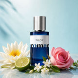 Oasis Noir perfume bottle with water lily, bergamot, jasmine and pink rose on pale aqua, fresh floral aquatic dupe by Aromara