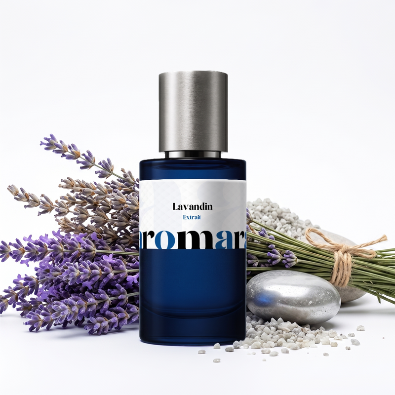 Lavandin by Aromara 50ml 35% Extrait spray, navy bottle with fresh lavender sprigs, a twine-tied lavender bundle, polished silver pebbles and white gravel
