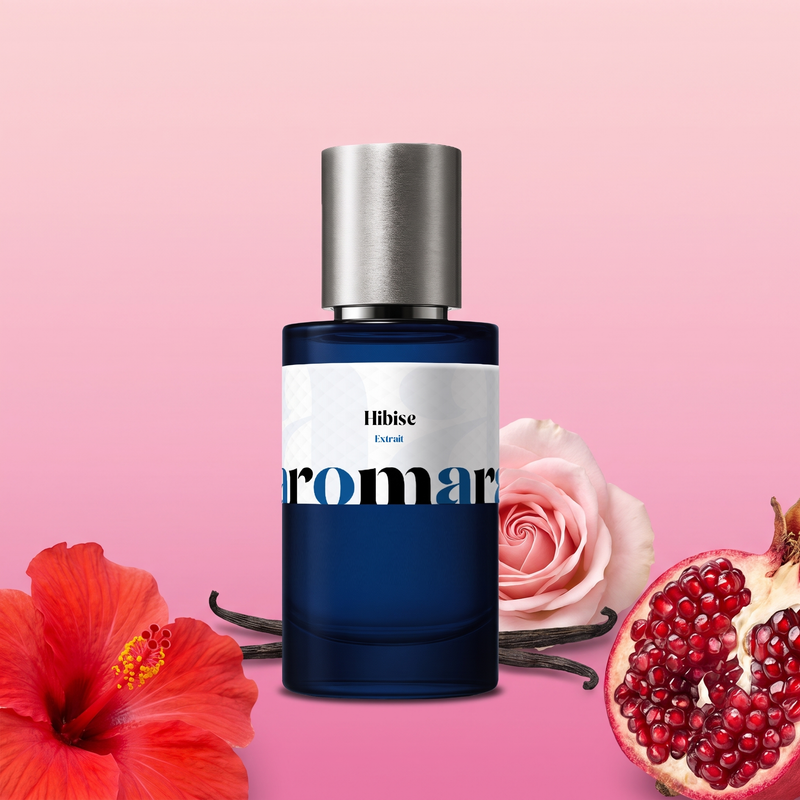 Hibisc by Aromara on a pale hibiscus pink and soft fuchsia background with a hibiscus flower, pomegranate, rose and vanilla pods. 35% Extrait, inspired by Maison Crivelli Hibiscus Mahajád.