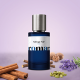 Solvage Noir by Aromara on a pale lavender to soft smoky lilac background with cinnamon sticks, lavender sprigs, nutmeg, cardamom pods and licorice root. 35% Extrait, inspired by Christian Dior Sauvage Elixir.