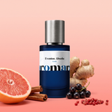 Eventus Absolu by Aromara on a pale grapefruit pink to soft coral background with pink grapefruit, blackcurrants, ginger root, cinnamon sticks and pink peppercorns. 35% Extrait, inspired by Creed Aventus Absolu.