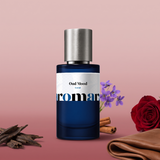 Oud Mood by Aromara on a pale dusty rose to soft rosewood pink background with oud wood chips, a red rose, violets, cinnamon sticks and soft leather. 35% Extrait, inspired by Maison Francis Kurkdjian Oud Satin Mood.