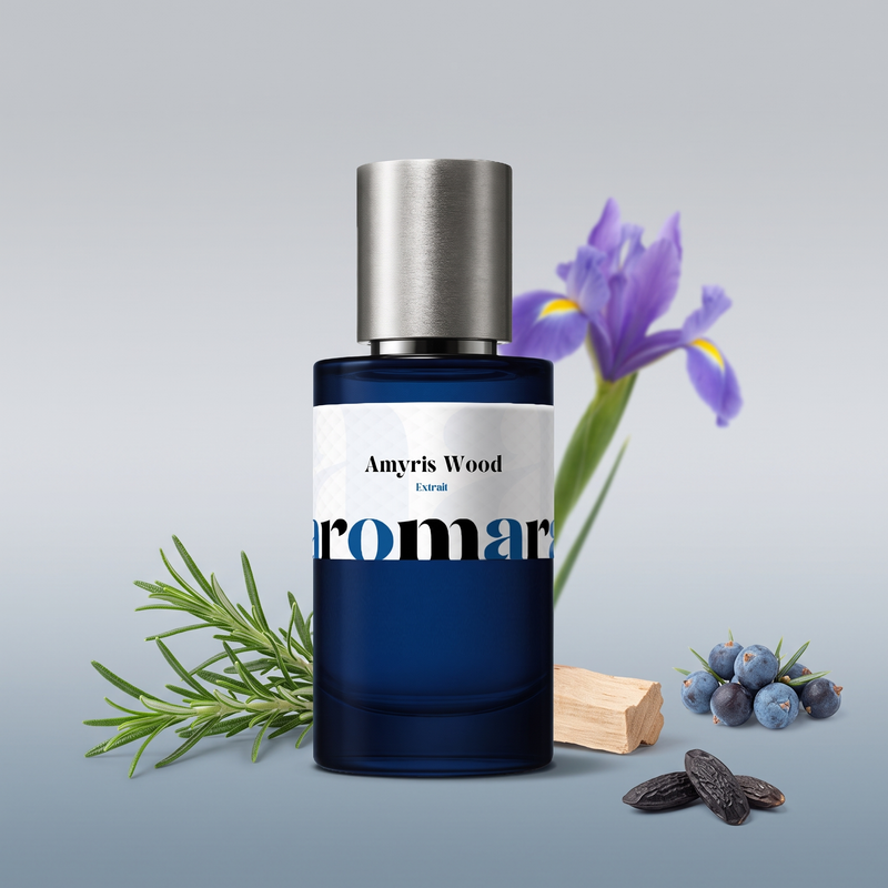 Amyris Wood by Aromara on a pale silver grey to soft juniper blue-grey background with rosemary, juniper berries, an iris flower, pale wood and tonka beans. 35% Extrait, inspired by Maison Francis Kurkdjian Amyris Homme.