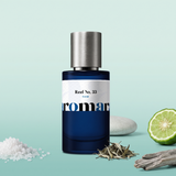 Reef No. 33 by Aromara on a pale ice mint and soft sea glass teal background with sea salt, bergamot, a sea stone, white tea and cedarwood. 35% Extrait, inspired by Reef 33.