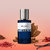 Spice Ember by Aromara on a pale ash rose and soft ember coral background with pink peppercorns, dried chillies, tobacco leaves, cinnamon sticks and vanilla pods. 35% Extrait, inspired by Viktor & Rolf Spicebomb Extreme.