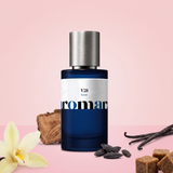 V28 by Aromara on a pale powder pink to soft marshmallow pink background with vanilla pods, a vanilla orchid, brown sugar cubes, tonka beans and cedarwood. 35% Extrait, inspired by Kayali Vanilla 28.