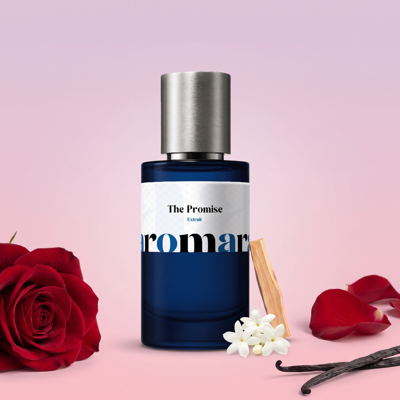 The Promise by Aromara on a pale lilac blush to soft peony pink background with a red rose, rose petals, sandalwood, jasmine and vanilla pods. 35% Extrait, inspired by Frédéric Malle Promise.