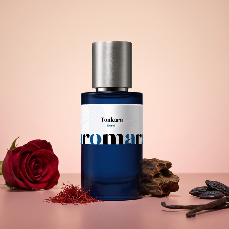Tonkara by Aromara on a pale blush to rosewood pink background with a red rose, saffron, oud wood, tonka beans and vanilla pods. 35% Extrait, inspired by Montale Arabians Tonka.