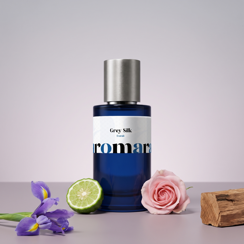 Grey Silk by Aromara on a pale dove grey to mauve grey background with iris flowers, bergamot, a pink rose and cedar wood. 35% Extrait, inspired by BDK Parfums Gris Charnel Extrait.