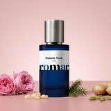 Damask Musk by Aromara on a pale powder pink to rose quartz background with damask roses, frankincense, a fir sprig, ginger and cardamom. 35% Extrait, inspired by Maison Crivelli Musc Nurāsana.