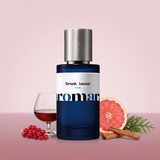 Drunk Amour by Aromara on a pale berry blush to wine rose background with a glass of brandy, redcurrants, pink grapefruit, cinnamon sticks and cypress. 35% Extrait, inspired by Born to Stand Out Drunk Lovers.