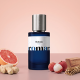 Hedonia by Aromara on a pale grapefruit blush to clay rose background with pink grapefruit, ginger root, lychees, cedarwood and vetiver roots. 35% Extrait, inspired by Ex Nihilo The Hedonist Extrait.