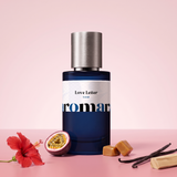 Love Letter by Aromara on a pale blush pink to hibiscus rose background with a red hibiscus flower, passionfruit, caramels, vanilla pods and sandalwood. 35% Extrait, inspired by Amouage Love Hibiscus.