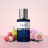 Lychee Bliss by Aromara on a pale lychee blush to soft peony pink background with lychees, a pear, a peony, a pink rose and vanilla pods. 35% Extrait, inspired by Kayali Eden Sparkling Lychee.
