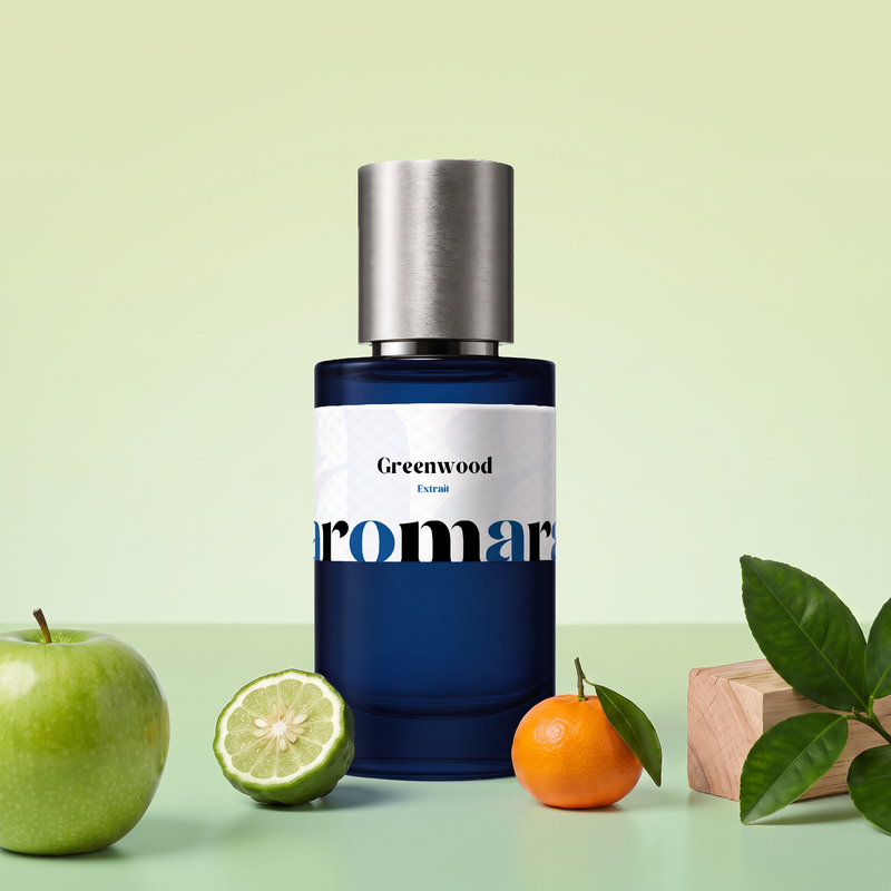 Greenwood by Aromara on a pale celery green to soft fresh leaf green background with a green apple, a halved bergamot, a mandarin, cedarwood and citrus leaves. 35% Extrait, inspired by Parfums de Marly Greenley.