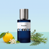 Beachside by Aromara on a pale sky blue to Mediterranean aqua background with a yuzu, neroli blossoms, rosemary, thyme and a cypress sprig. 35% Extrait, inspired by Louis Vuitton On The Beach.