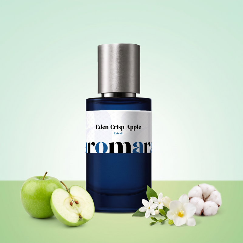 Eden Crisp Apple by Aromara on a pale mint cream to green apple background with green apples, jasmine, a white freesia and a cotton flower. 35% Extrait, inspired by Kayali Eden Juicy Apple.