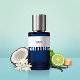 Lagoon by Aromara on a pale seafoam to soft lagoon turquoise background with a halved coconut, tiare flowers, bergamot, vanilla pods and sandalwood. 35% Extrait, inspired by Kayali Maldives Ylang Coco 20.